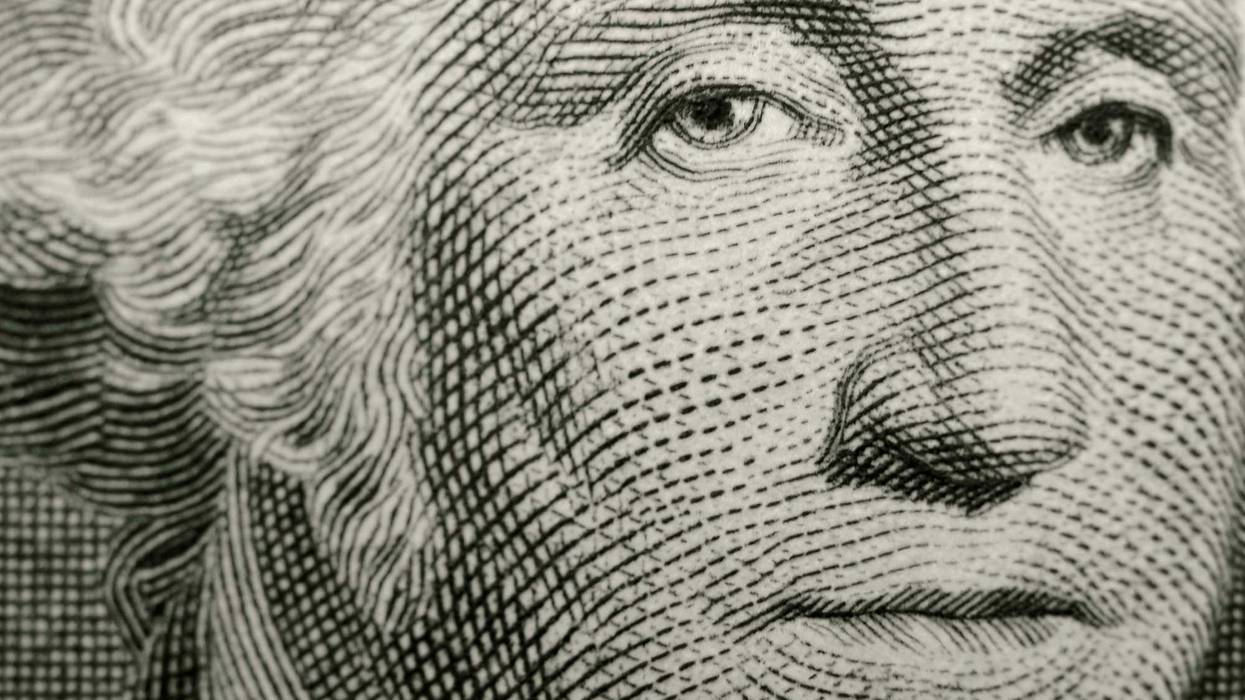 Close up of George Washington on the dollar bill.