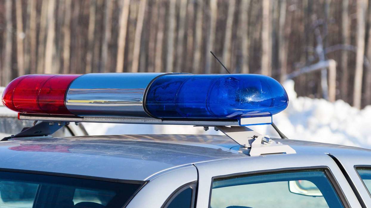 Close-up of the colorful lights on top of a squad car