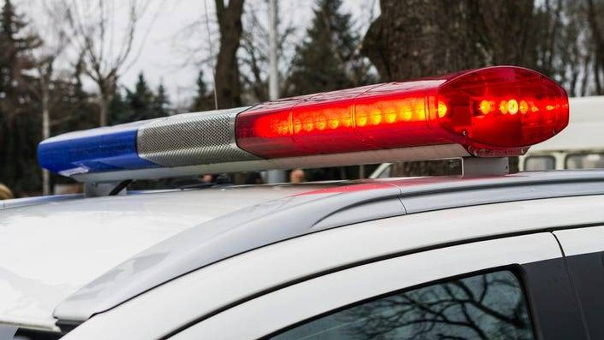 Close up picture of the flashing lights on top of a police car.