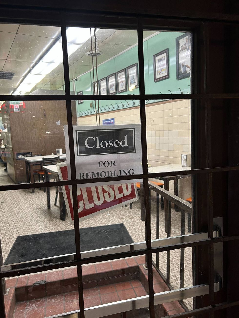 "Closed for remodeling sign" on door at Lafayette Coney Island