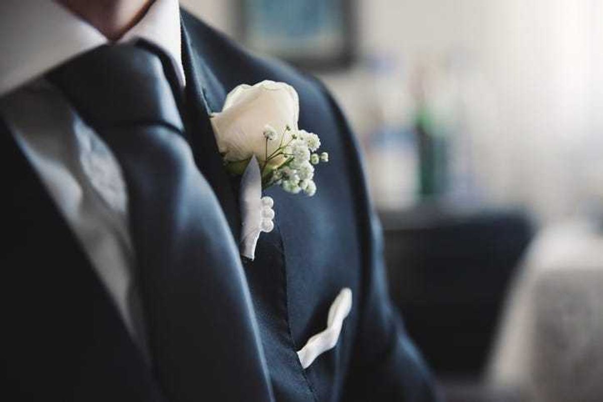 Closeup of a groom at his wedding.