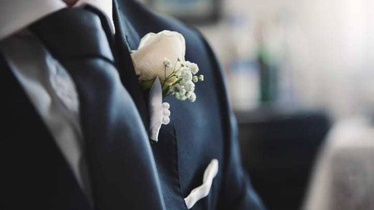 Closeup of a groom at his wedding.