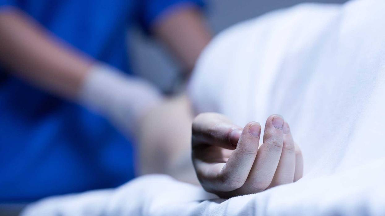 Closeup of lurid hand of dead body