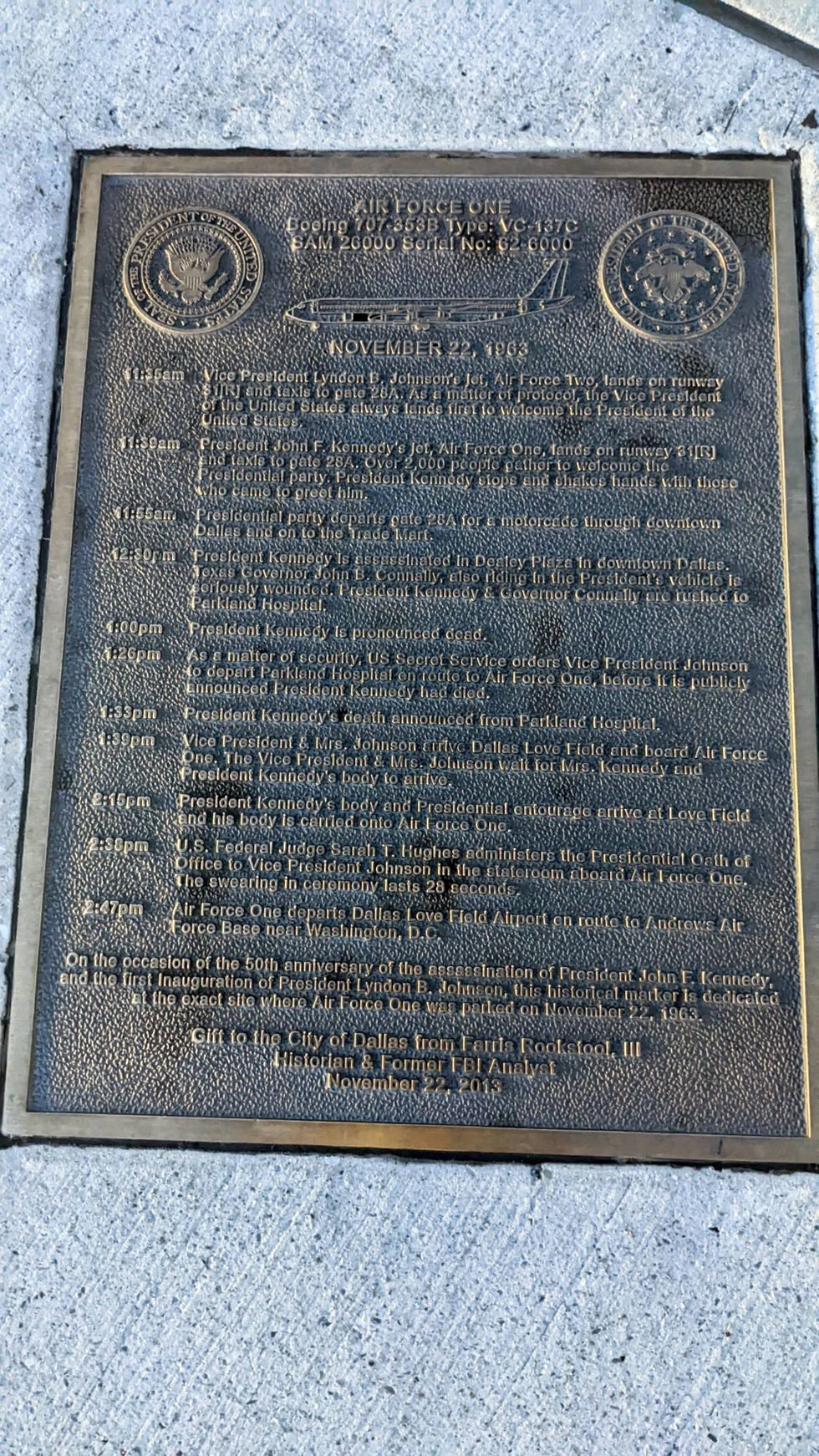 Closeup of plaque embedded in tarmac at Dallas Love Field