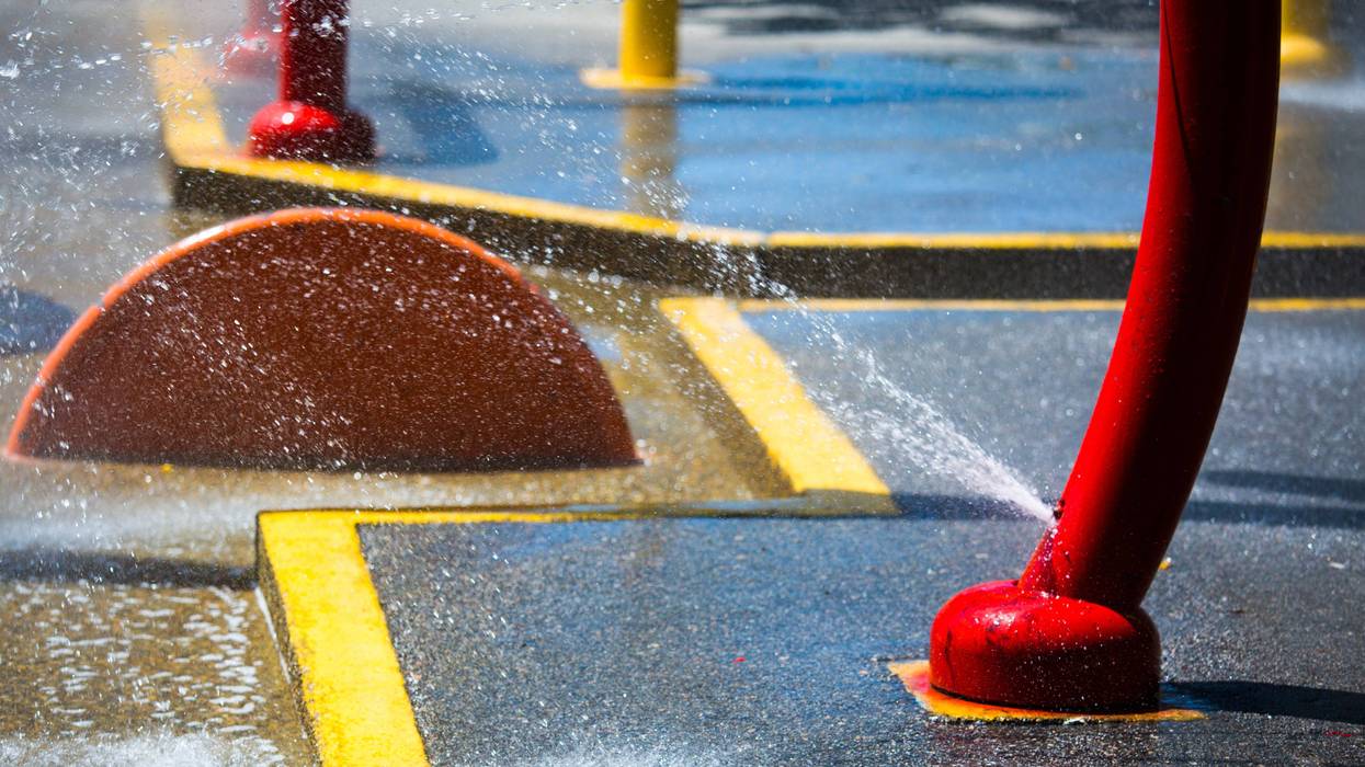 Closeup of water spraying from rings at splash park