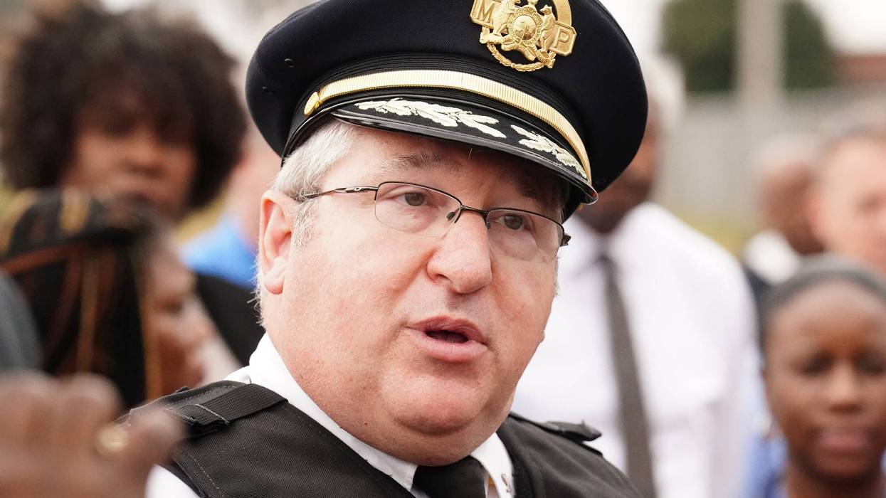 clsoe up of lt col steve sack. white man white hair little glasses captains hat