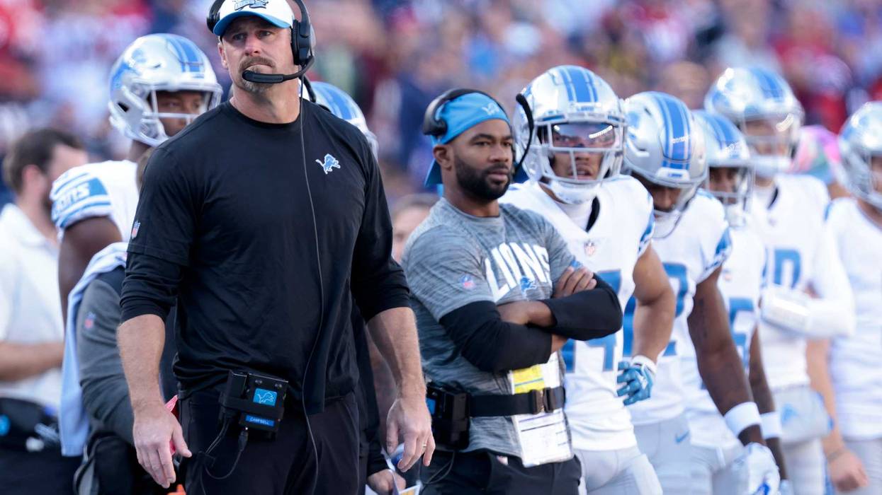 Coach Dan Campbell and Lions players