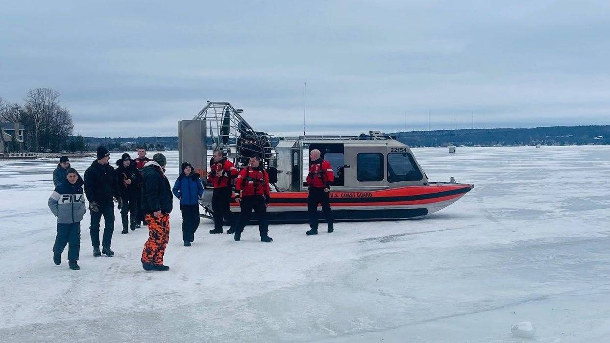 Coast Guard rescuing people stuck on Lake Michigan