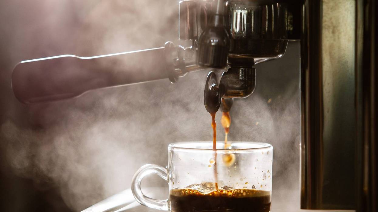 Coffee pouring into a cup.