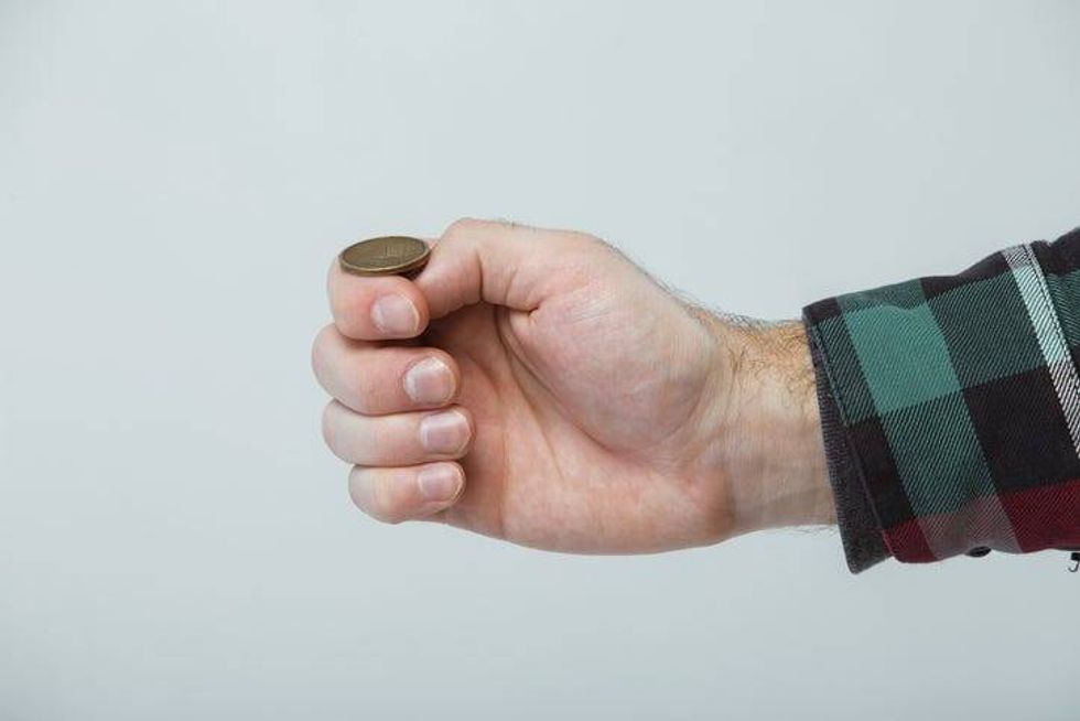 Newlyweds Flip a Coin To Decide Whose Last Name To Take