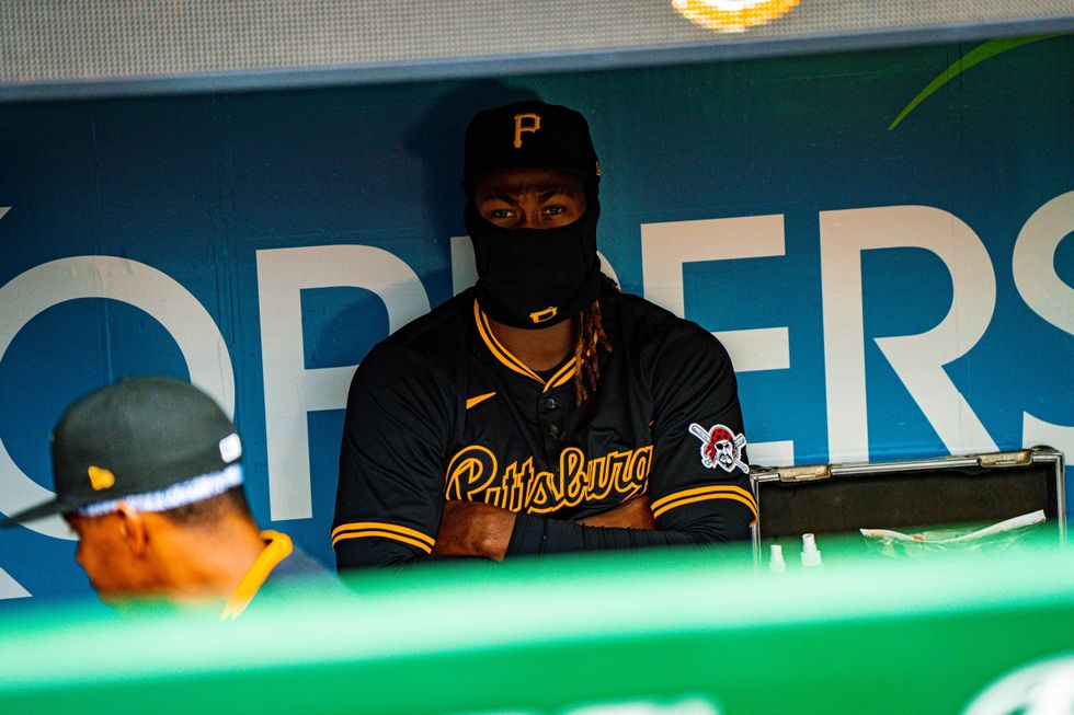 cold Pirates player in dugout