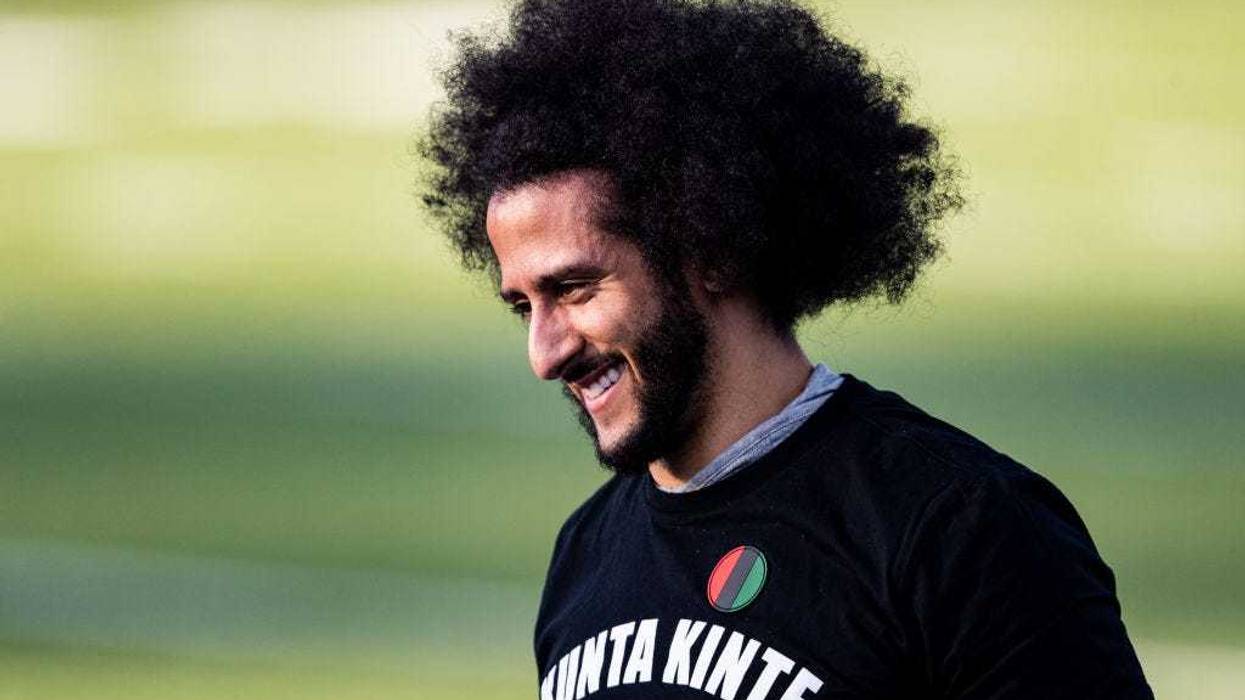 Colin Kaepernick looks on during his NFL workout held at Charles R Drew high school on November 16, 2019 in Riverdale, Georgia.