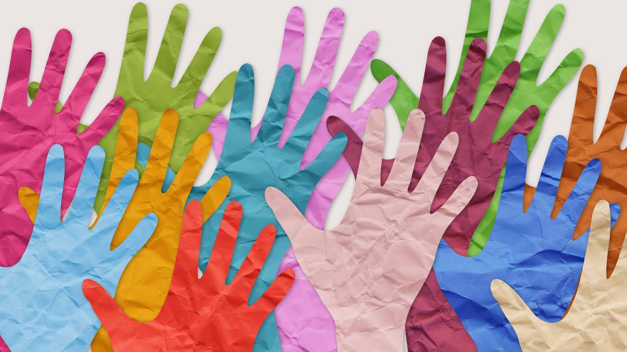 collage of colorful paper hands