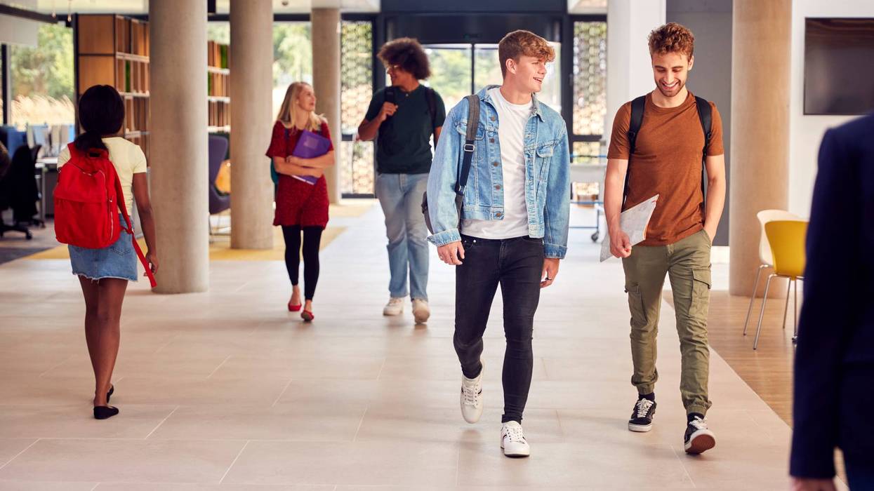 college students walk together