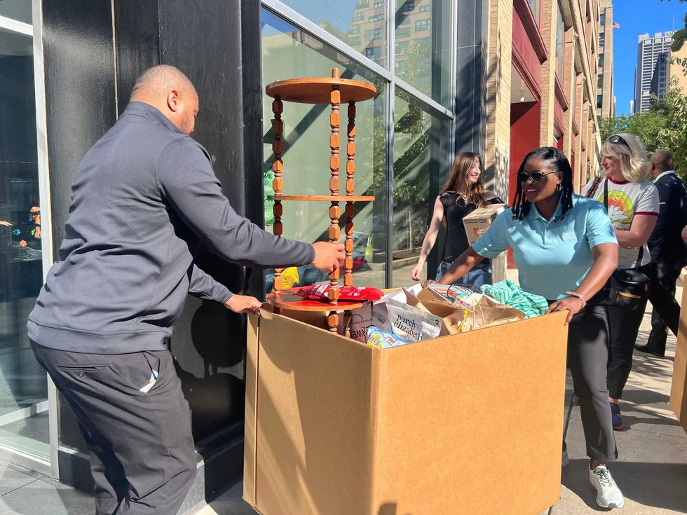 Columbia College President Shantay Bolton helps students and families during move-in day.