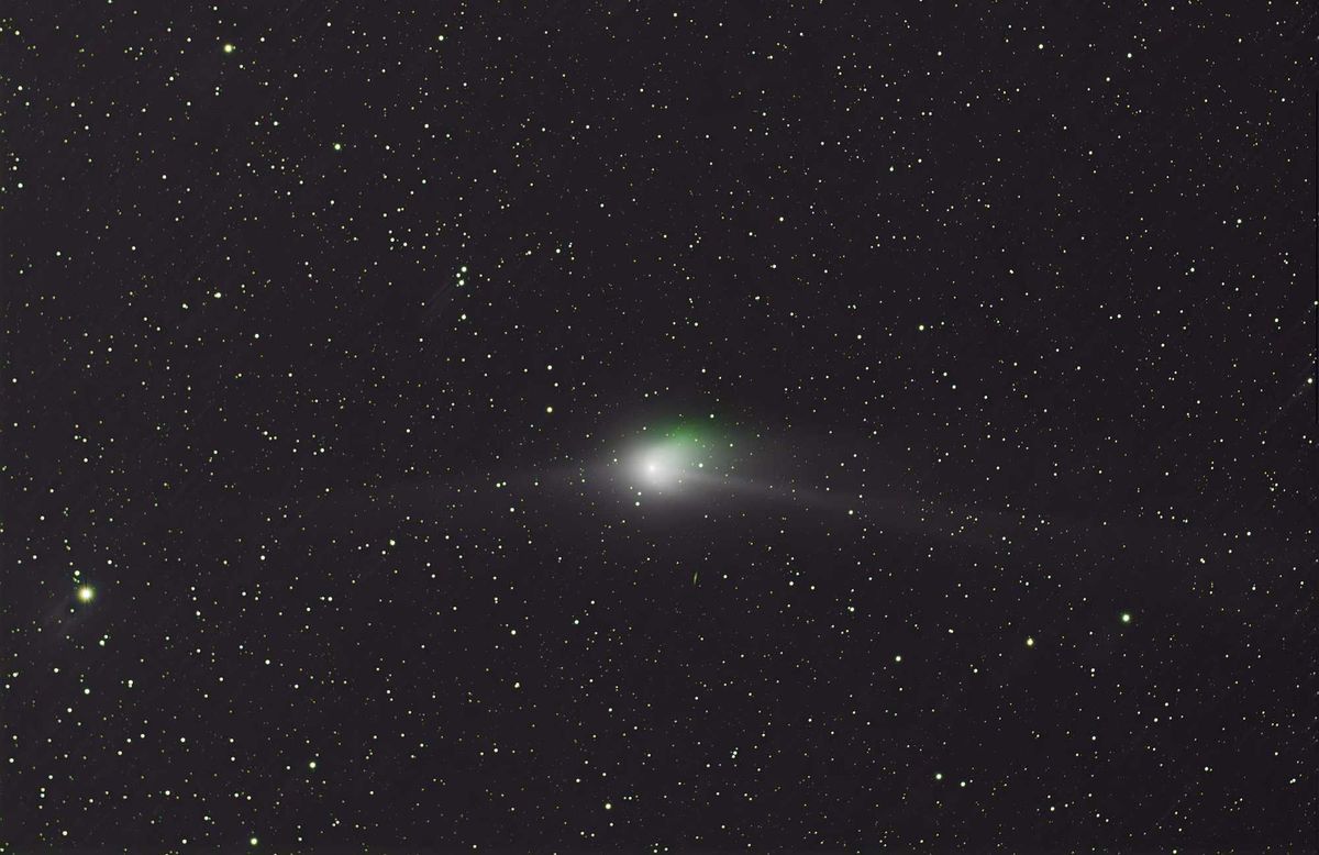 Comet flying through the night sky.
