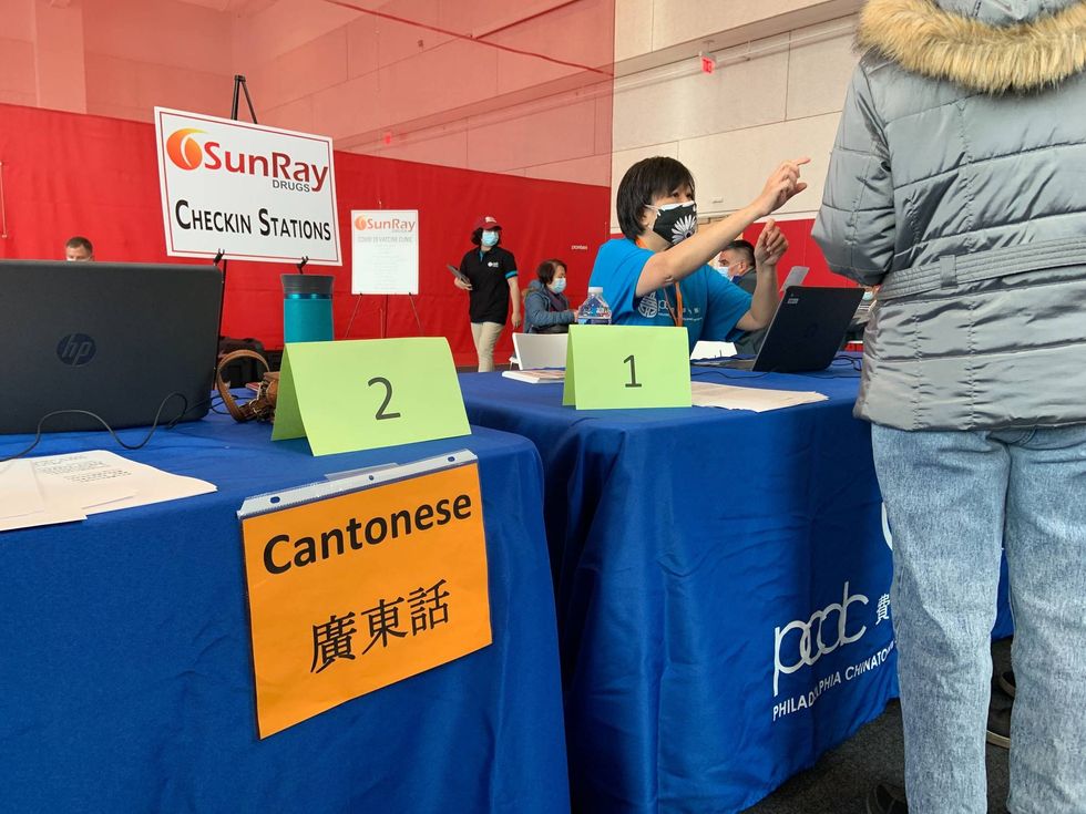 Community members were able to check in with volunteers and ask questions in English, Spanish, or one of four Chinese dialects.