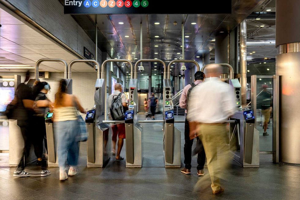 Commuters during morning rush hour at the Fulton Center subway station in New York