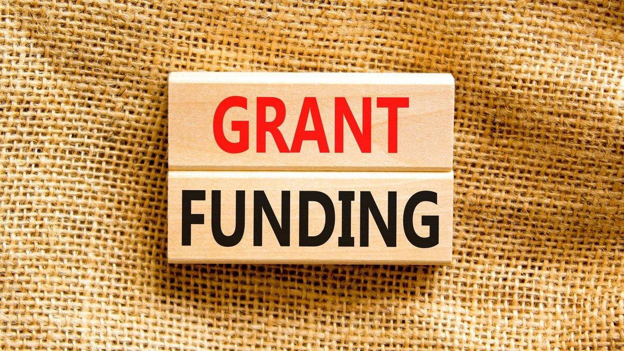 Concept words Grant funding on wooden blocks