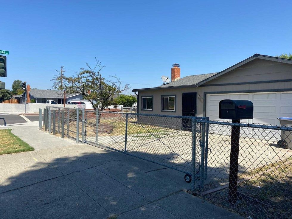 Concrete fence surrounds Ray Minter