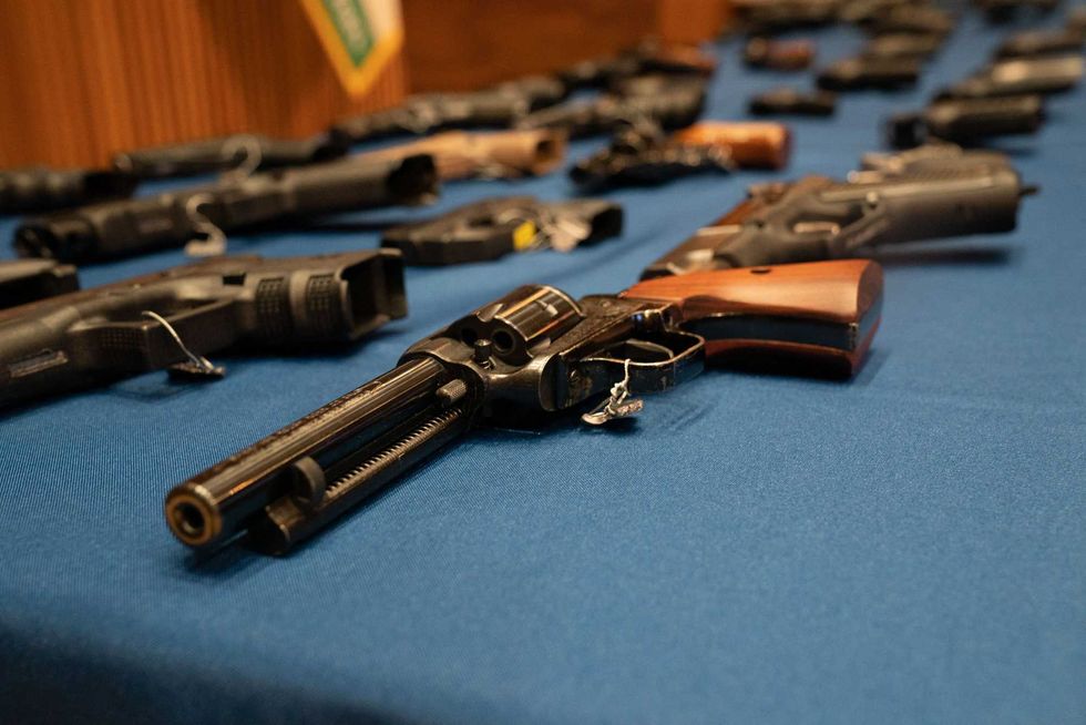 Confiscated guns on display during a press conference at 1 Police Plaza in Manhattan