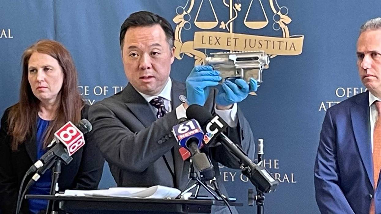 Connecticut Attorney General William Tong displays a "ghost gun" component shipped-- he says illegally-- to Connecticut by a Florida dealer, 3/7/23
