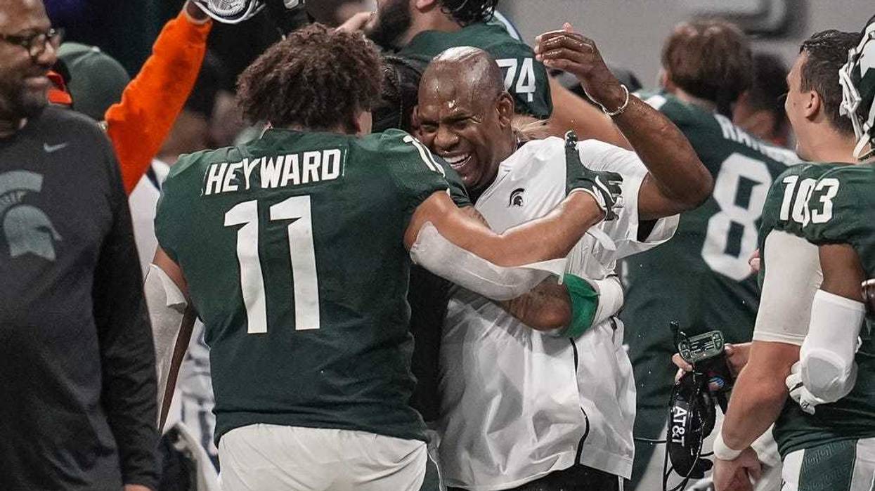 Connor Heyward hugs MSU coach
