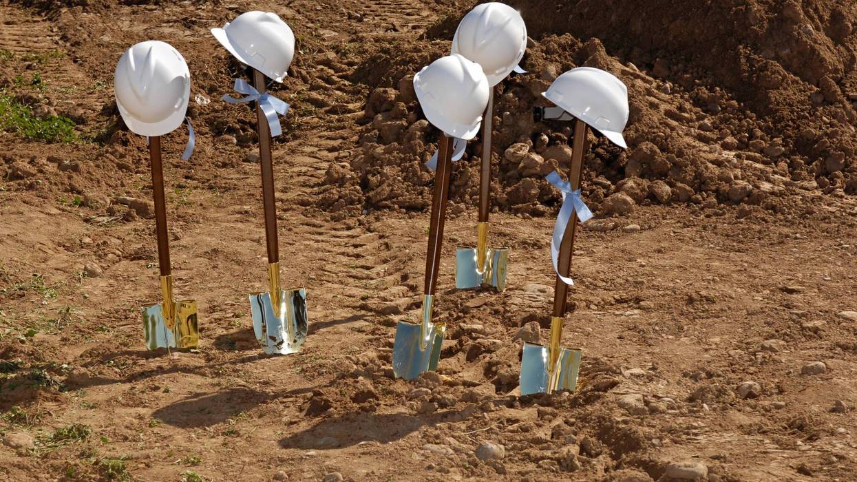 Construction shovels at a groundbreaking.