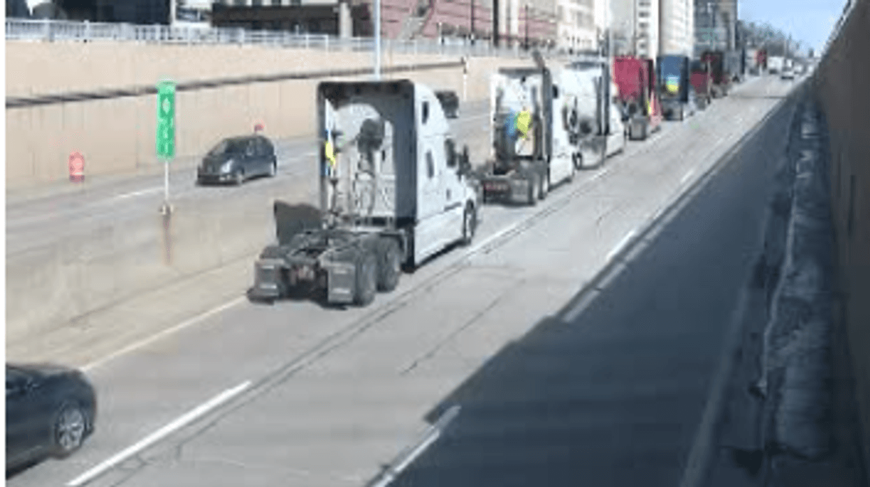 Convoy of trucks with Ukrainian flags in Detroit
