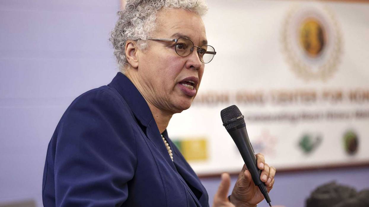 Cook County Board President Toni Preckwinkle speaking with microphone