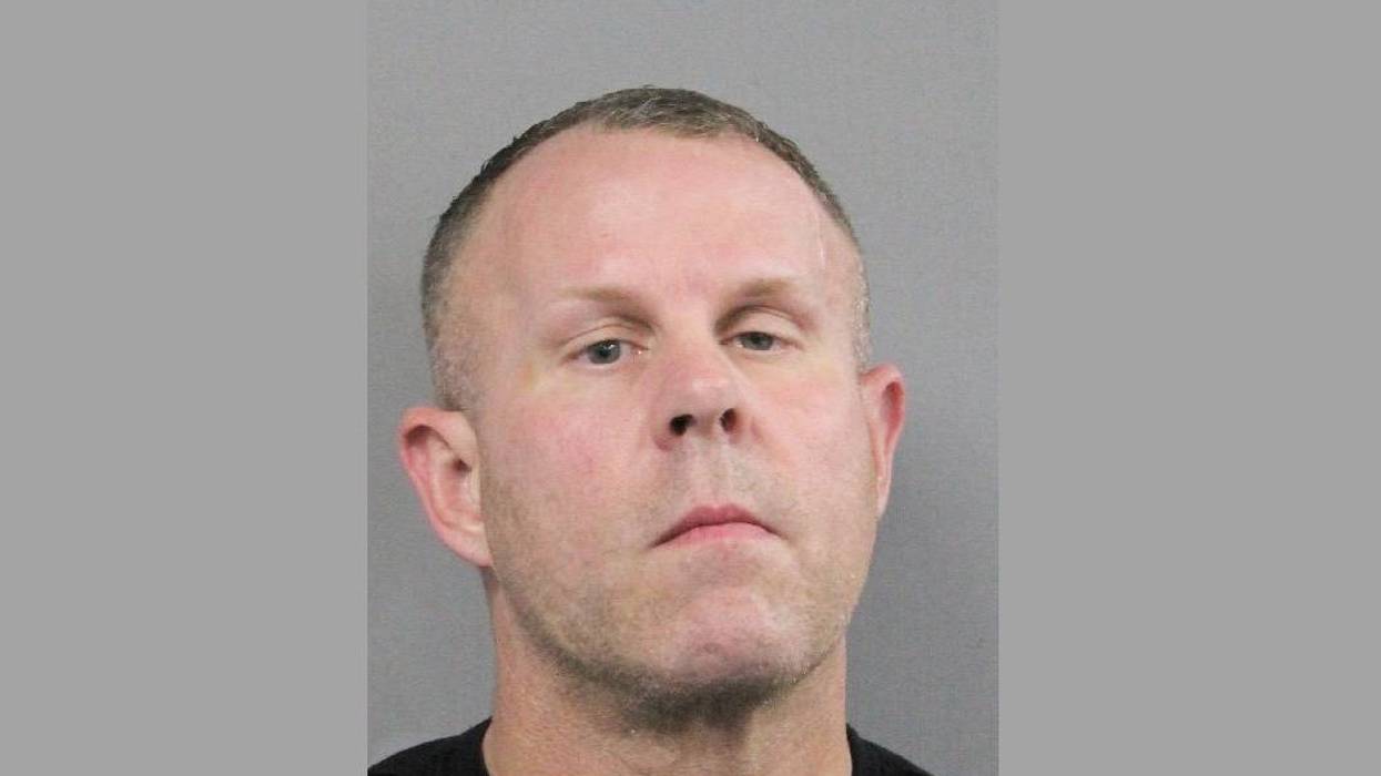Cop Arrested