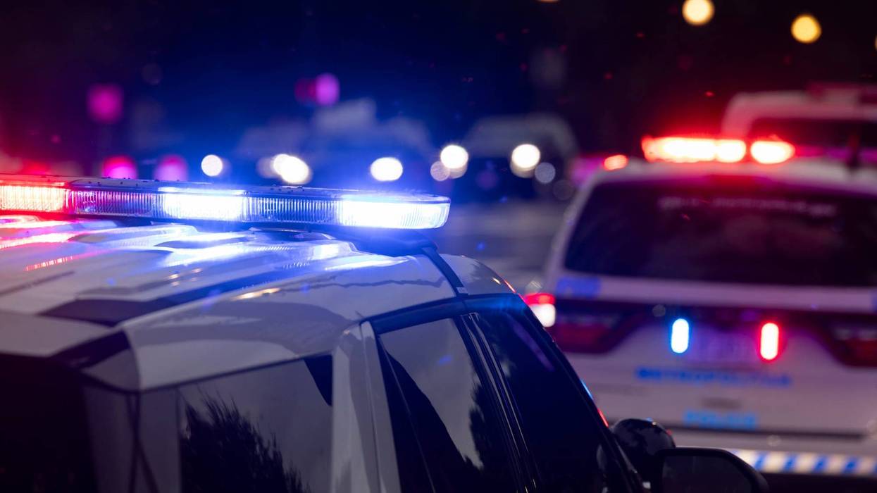 Cop cars with lights on