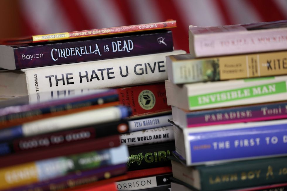 Copies of banned books from various states and school systems from around the county are seen during a press conference by U.S. House Democratic Leader Hakeem Jeffries (D-NY) at the U.S. Capitol on March 24, 2023 in Washington, DC.