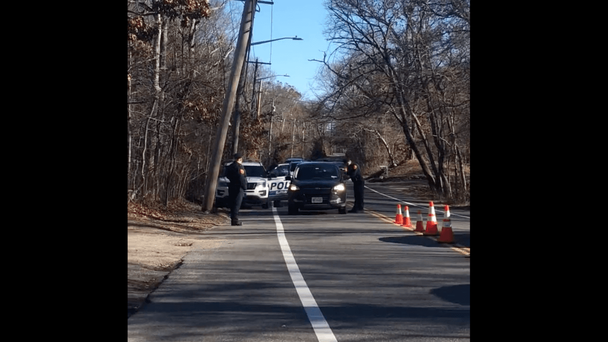 Coram checkpoint where police are searching for the driver wanted in a deadly hit-and-run crash that killed a 13-year-old boy and injured his sister.