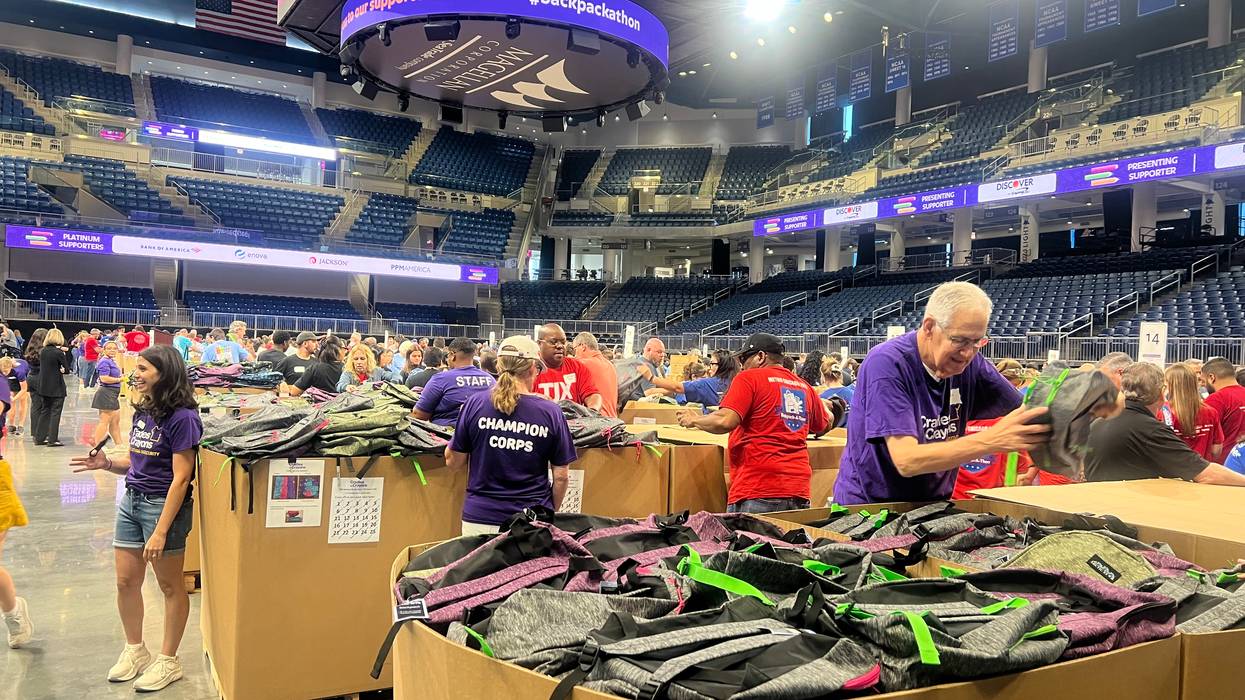 Corporate Volunteers Stuff Backpacks With School Supplies For Chicago Kids