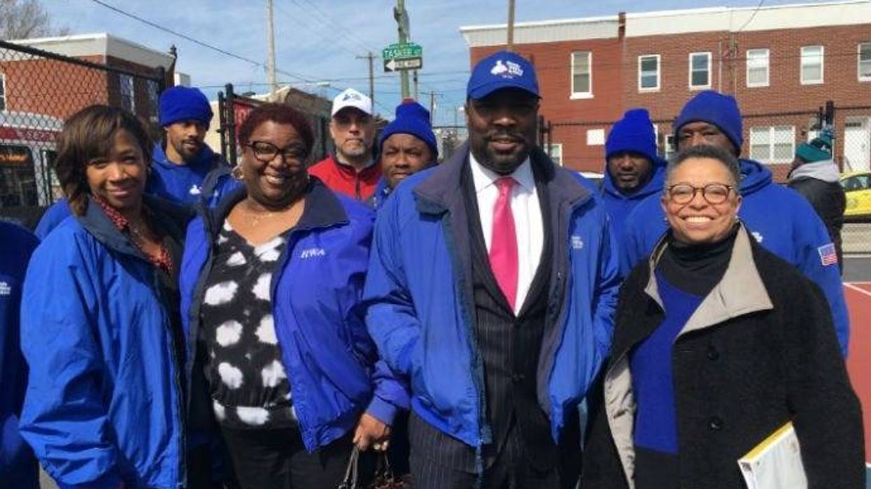 Councilman Kenyatta Johnson with Urban League director Charlene Matlock Turner and workers and officials from Ready, Willing and Able.