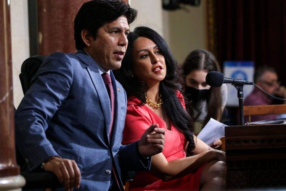 Councilman Kevin de León, left, and Los Angeles City Council President Nury Martinez confer at city council meeting on Tuesday, Oct. 4, 2022, in Los Angeles.