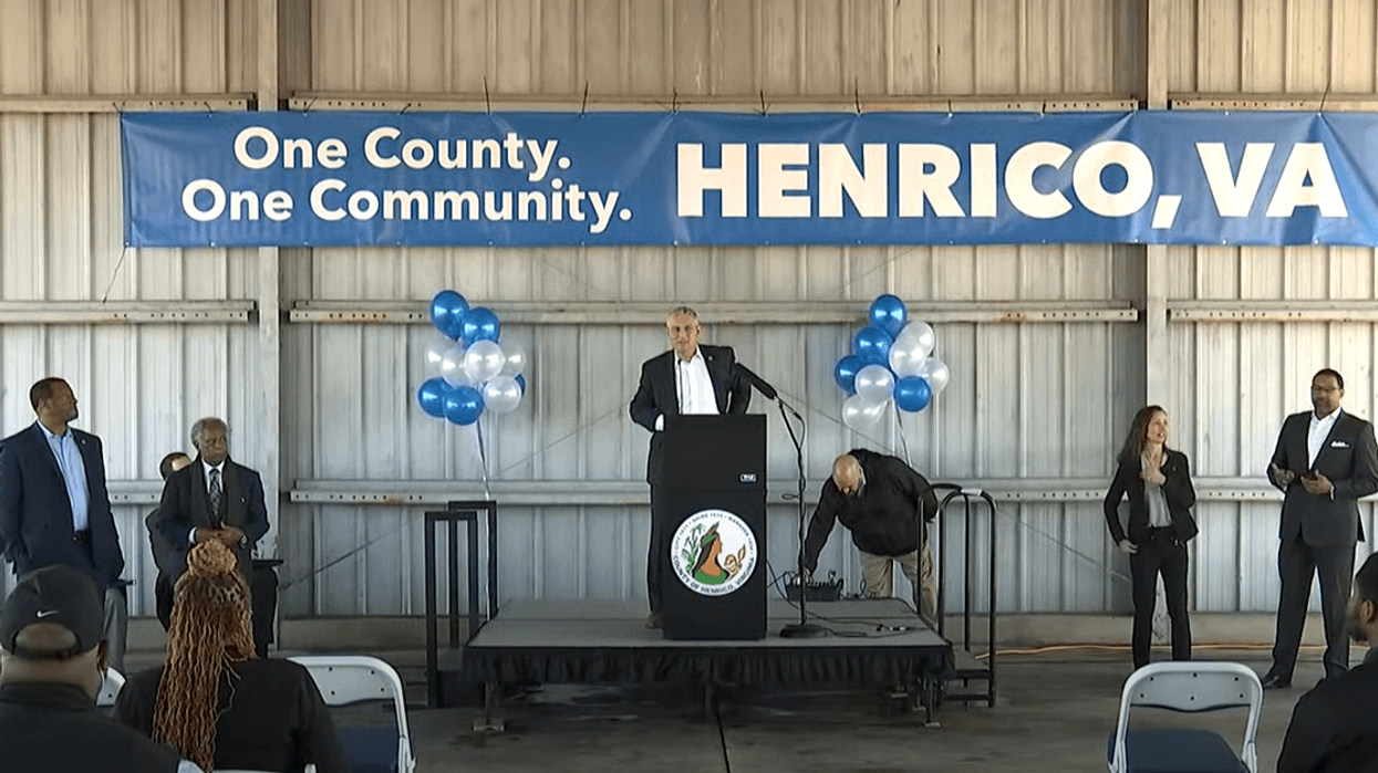 County Manager John Vithoulkas on a podium, addressing County employees