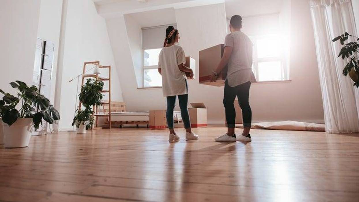 Couple Moving Into A House