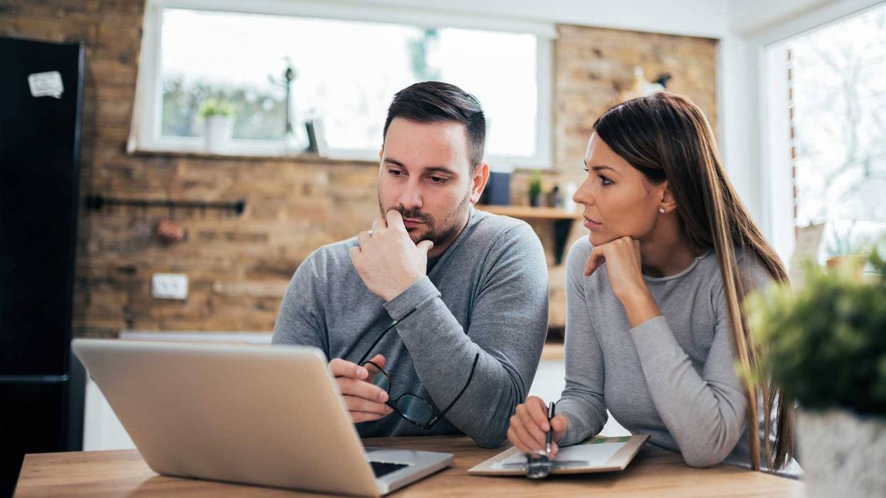 Couple pondering something together.