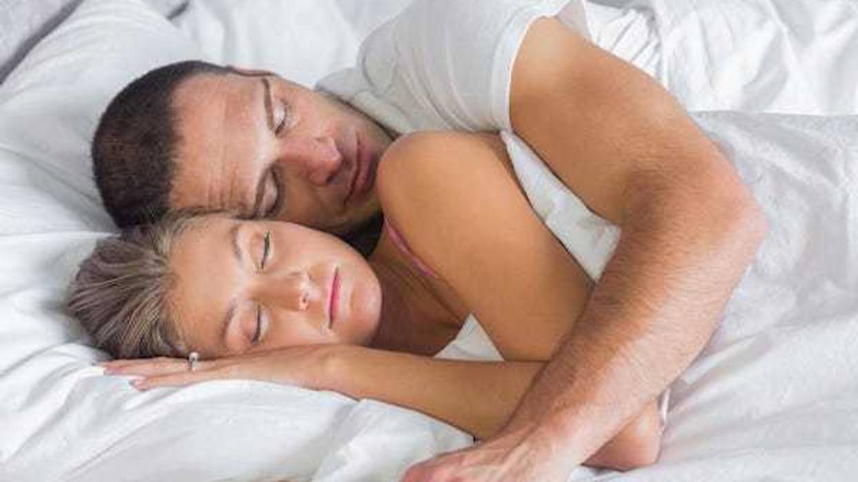 Couple spooning in bed