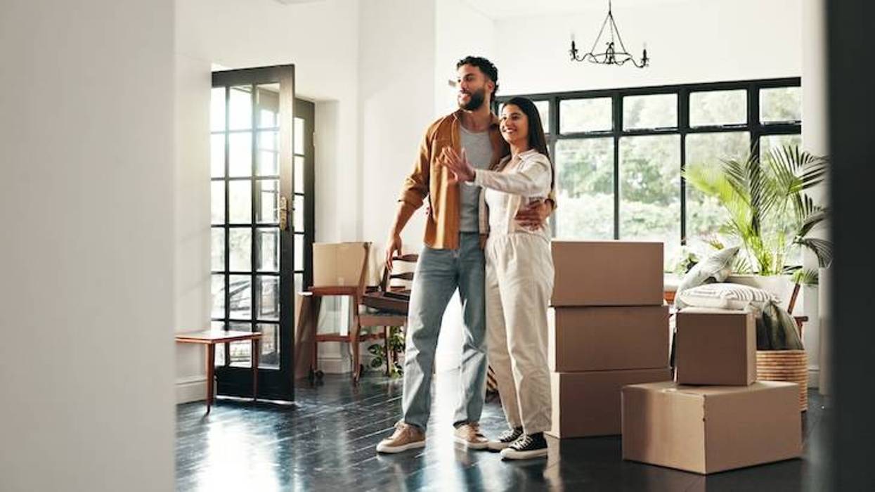 Couple unpacking in their first home
