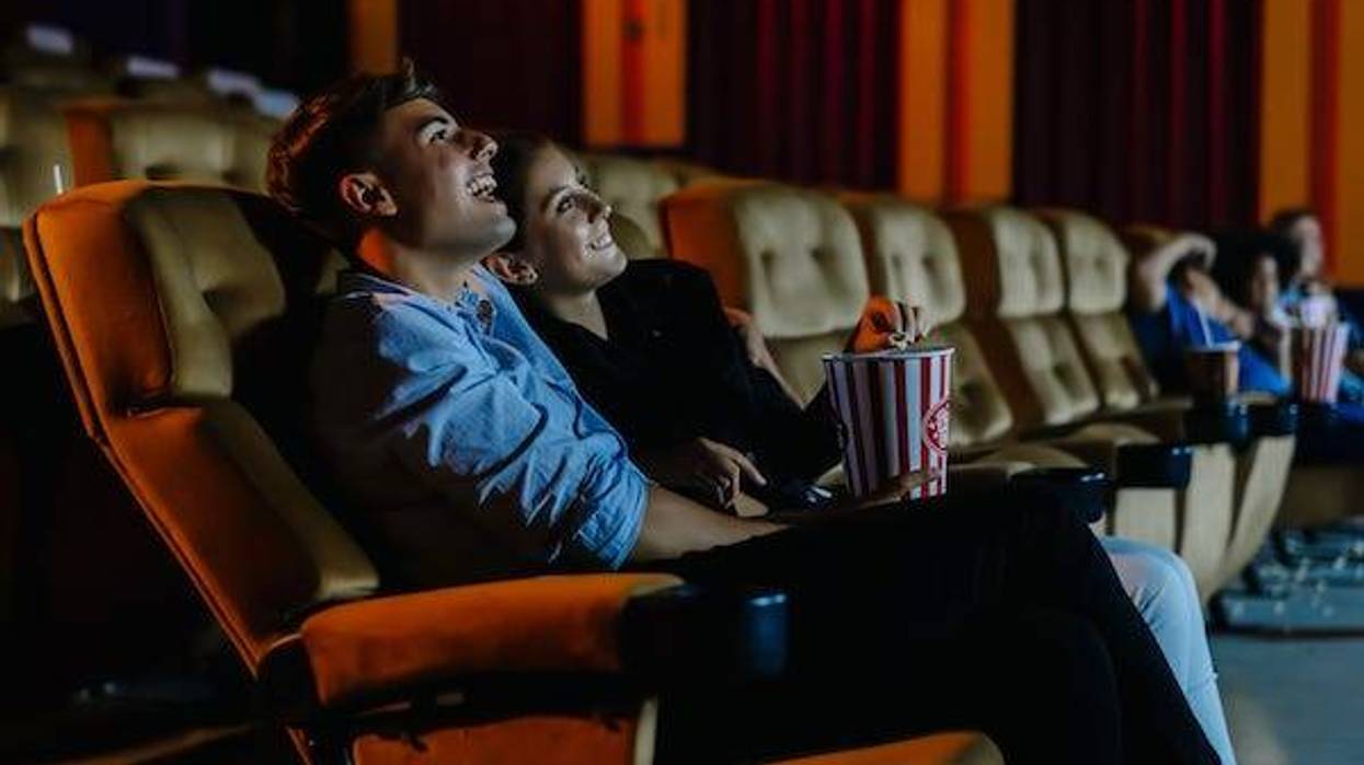 Couple watching movie in a theater