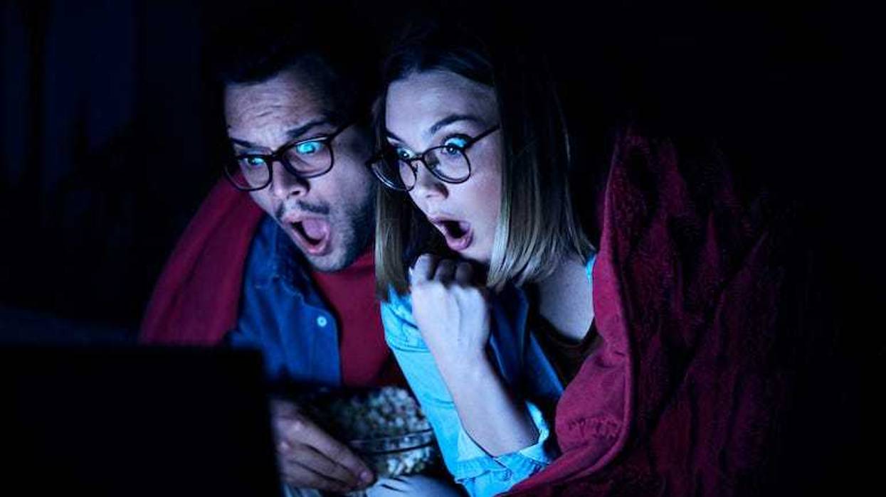 Couple watching videos in dark