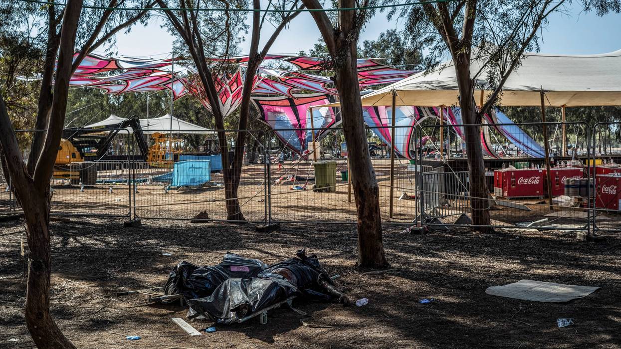 Covered bodies of Hamas militants were seen at the site of the Supernova desert music festival, Oct. 12, 2023, after Israeli forces secured areas around Re'im, Israel.