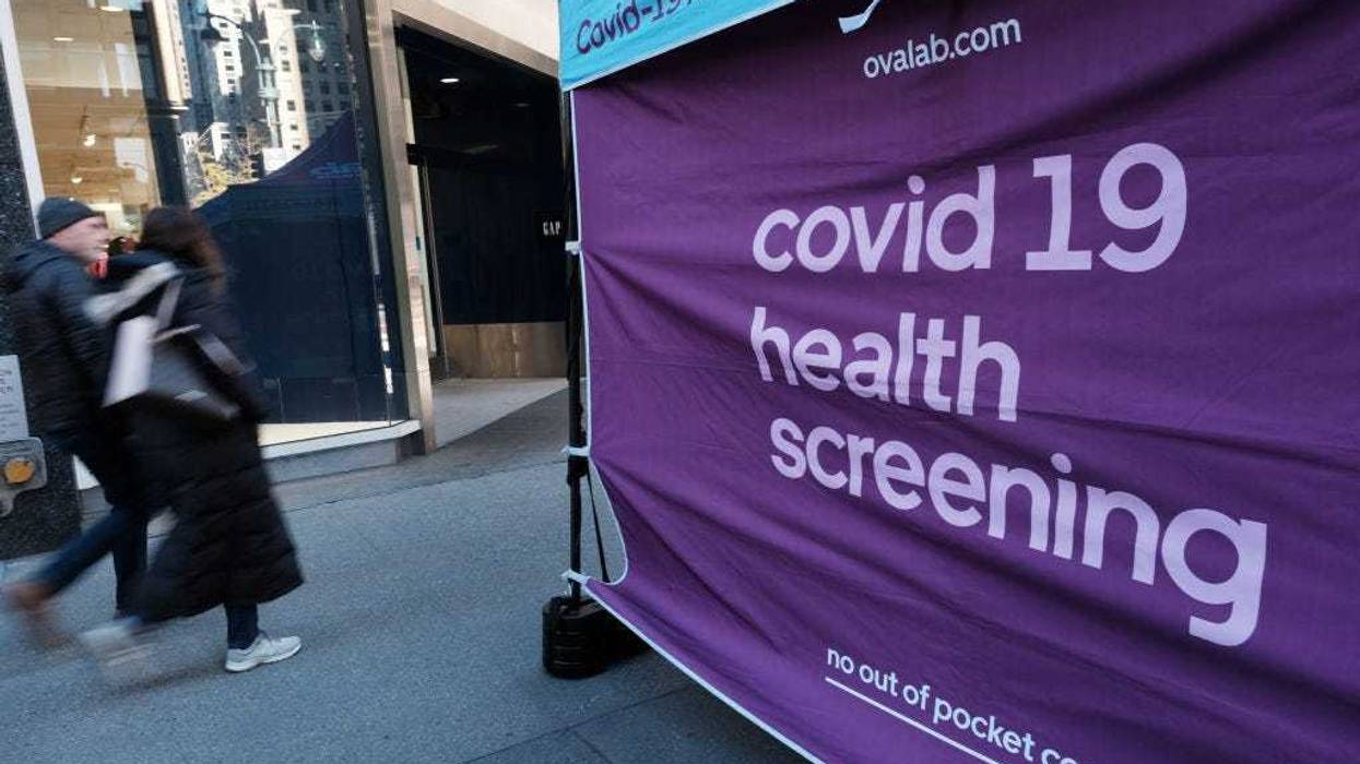 COVID-19 testing site stands on a sidewalk in Midtown Manhattan on December 09, 2022 in New York City.