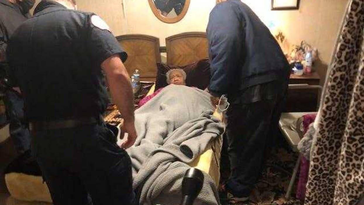 COVID-19 VaccineTwo firefighter-paramedics on a COVID-19 vaccination detail paid a visit to the home of Mrs. Elizabeth Holmes, 99, near the United Center, with the one-dose Johnson & Johnson vaccine.