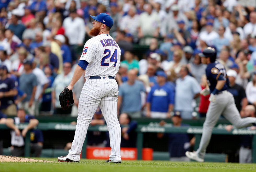 Craig Kimbrel reacts after serving up a home run to Milwaukee slugger Christian Yelich