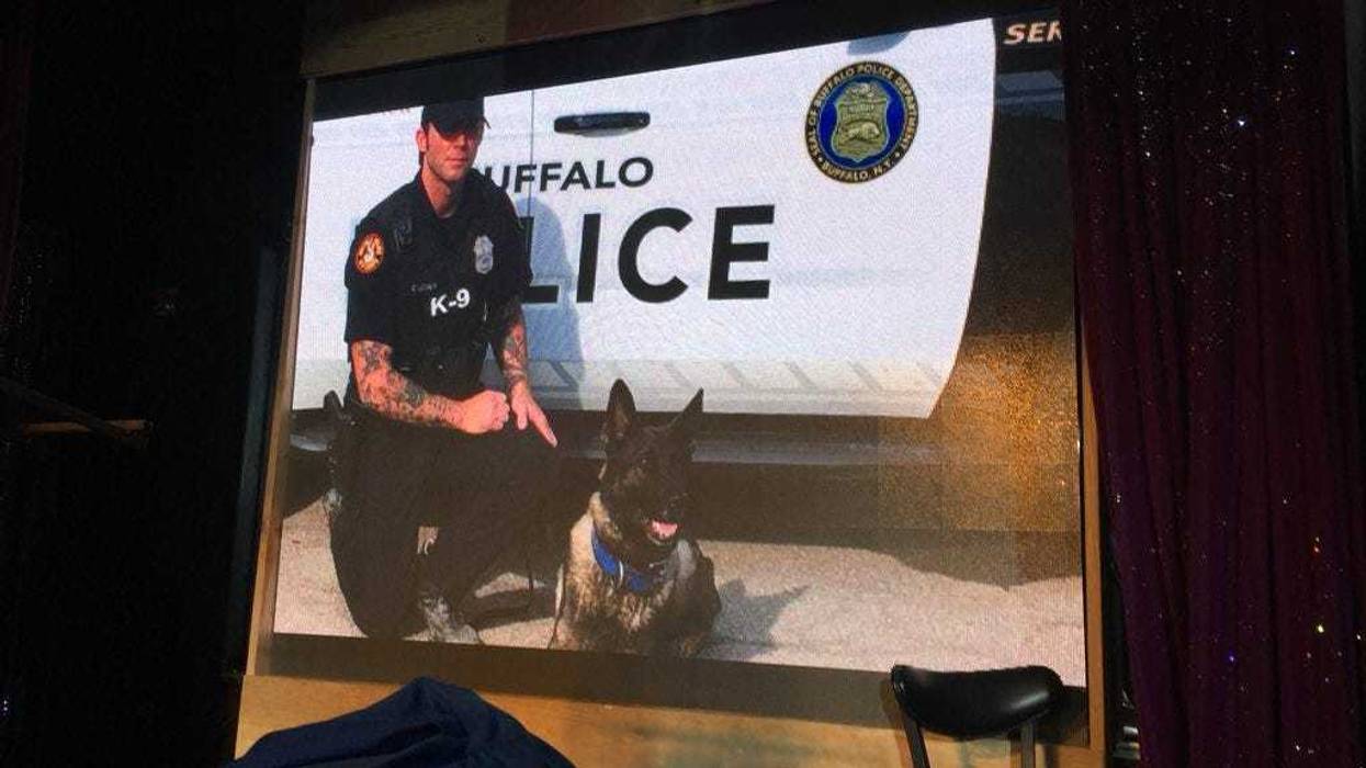 Craig Lehner with his K9, Shield, at a memorial event in Buffalo. 2017