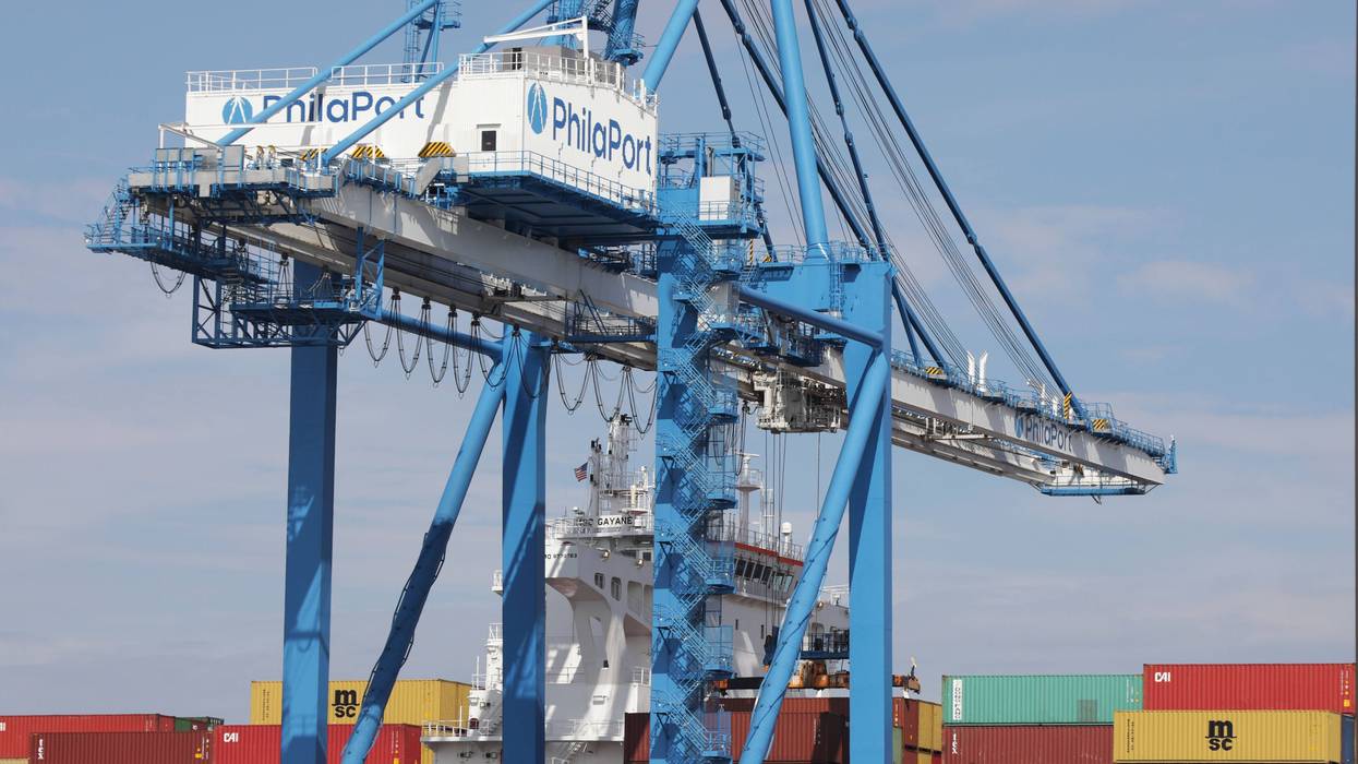 Cranes unload the freight ship MSC Gayane at the Packer Marine Terminal in Philadelphia, Pennsylvania on June 18, 2019.